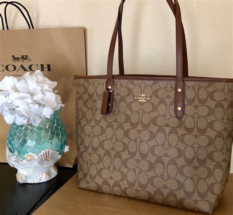 carteras coach originales